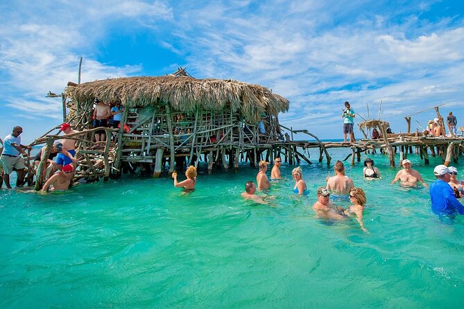 Appleton Rum Tour and Floyd’s Pelican Bar from Montego Bay Hotels and Villas - Taking the small boat to Floyd’s Pelican Bar