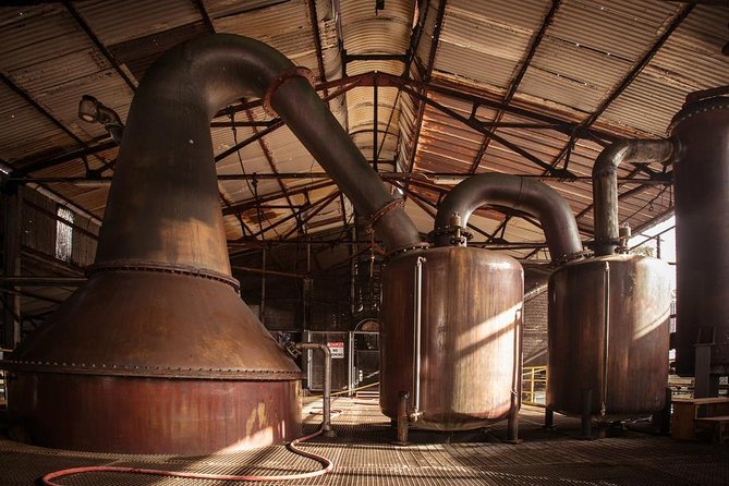 Copper pot still in a Jamaican distillery hall