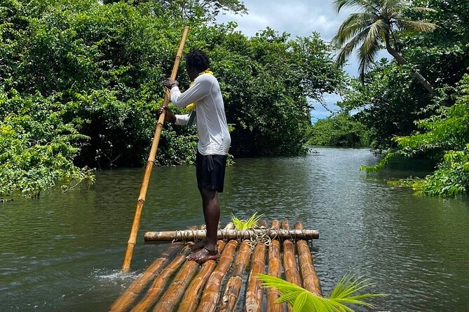 St Lucia Bamboo Rafting Experience (+Rum Tasting) - Boarding the island gondola at Roseau Beach